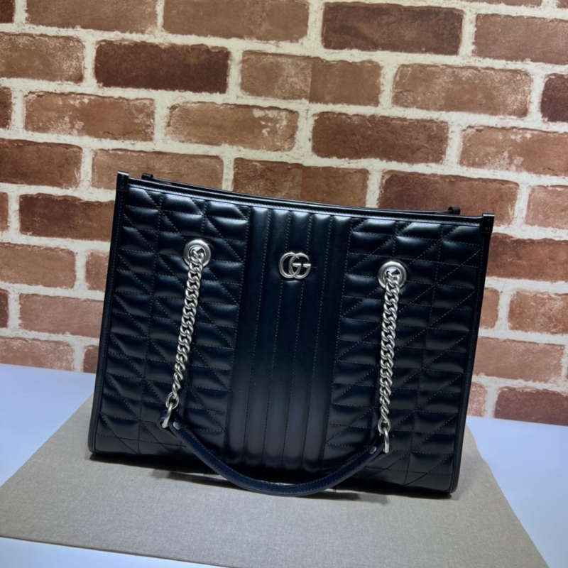 G*u*i shopping bags